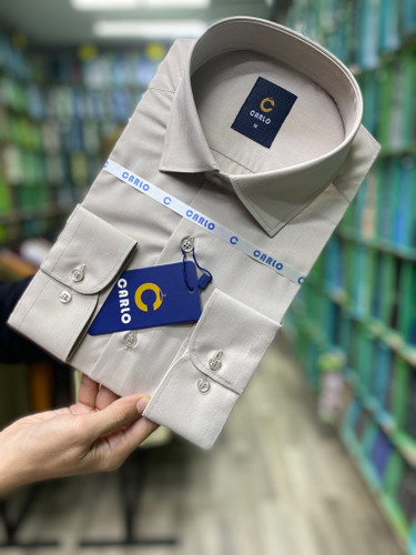 پیراهن مردانه تترون ساده کرم روشن آستین بلند تک جیب homaymen